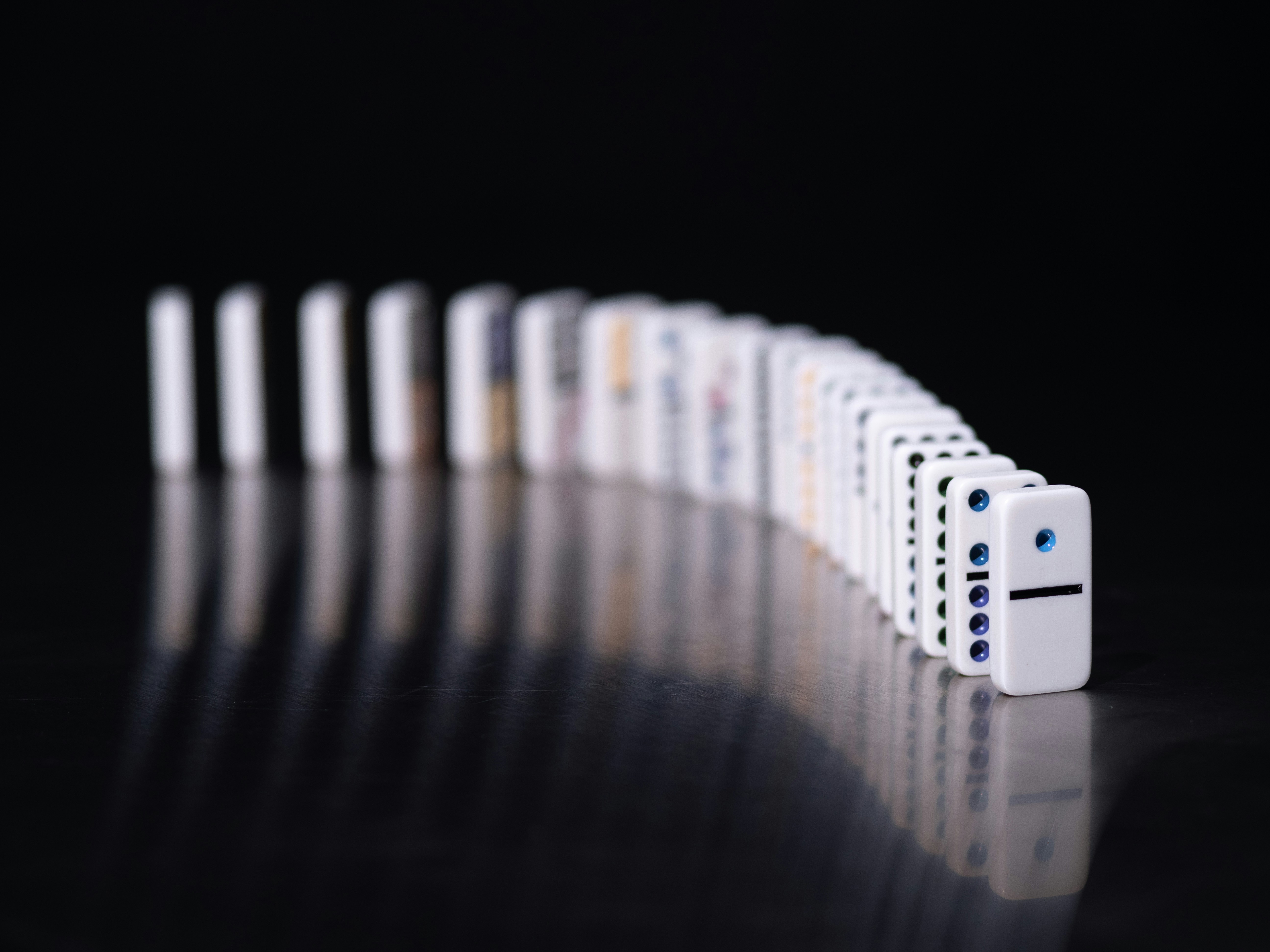 A set of dominos stacked in a row.