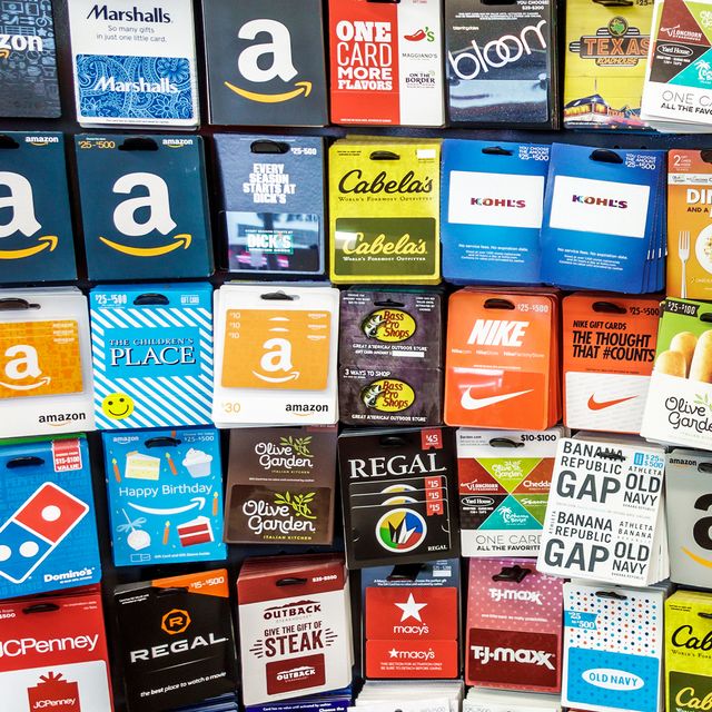 A store display with multiple gift cards for different retailers.